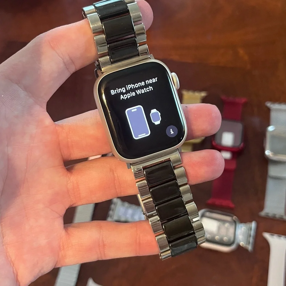 Apple Watch Series 8 w/band collection and cases.